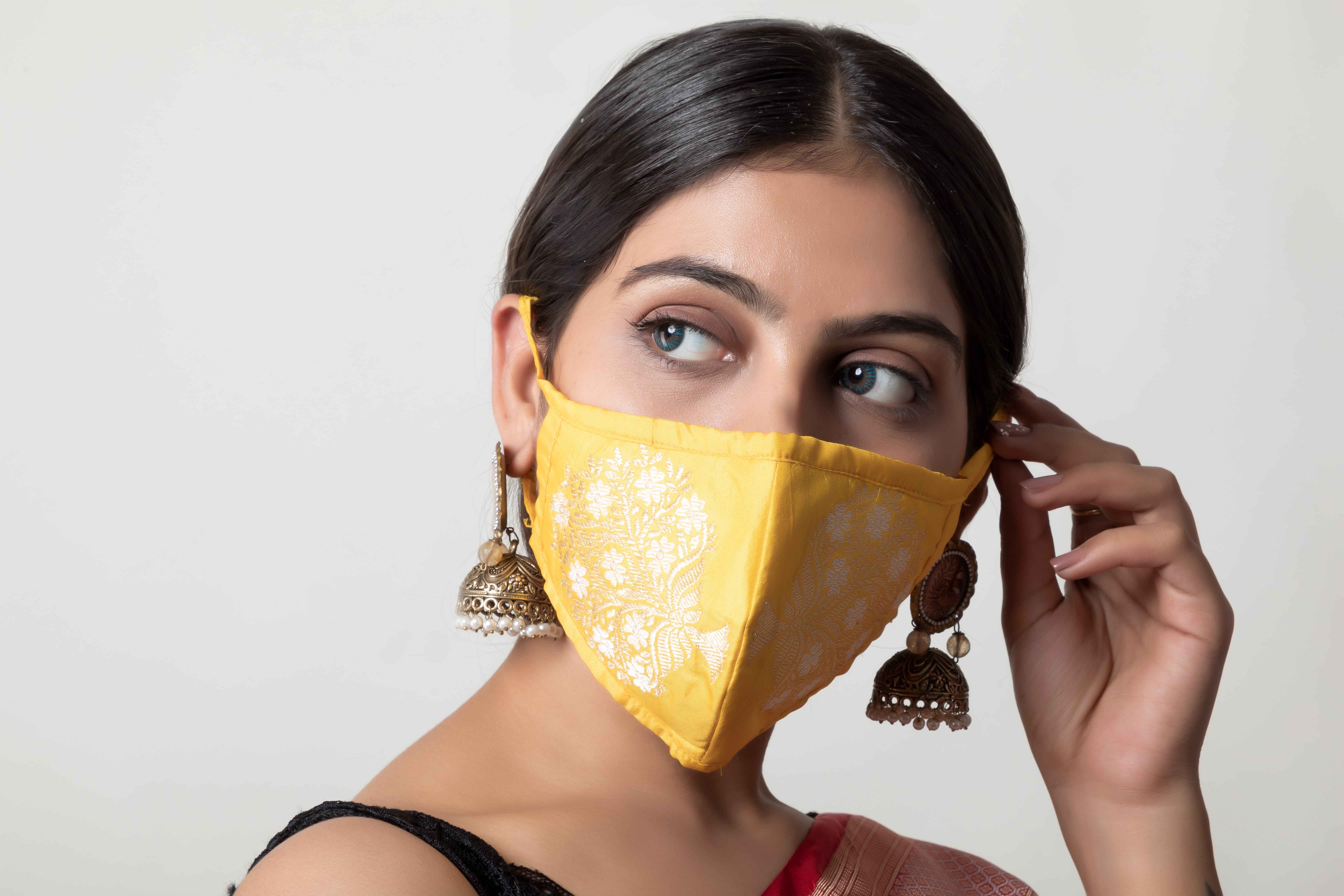 Handwoven yellow colour silk mask